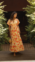 Robe longue à taille marquée et imprimé végétal